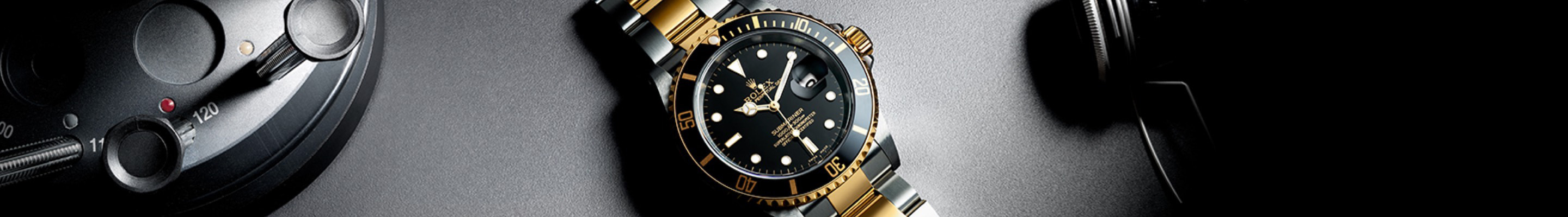 Rolex Gold and Black colored watch
