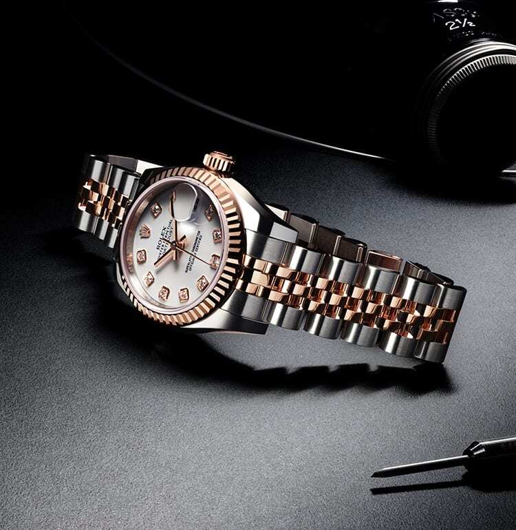 Rolex rose steel colored watch